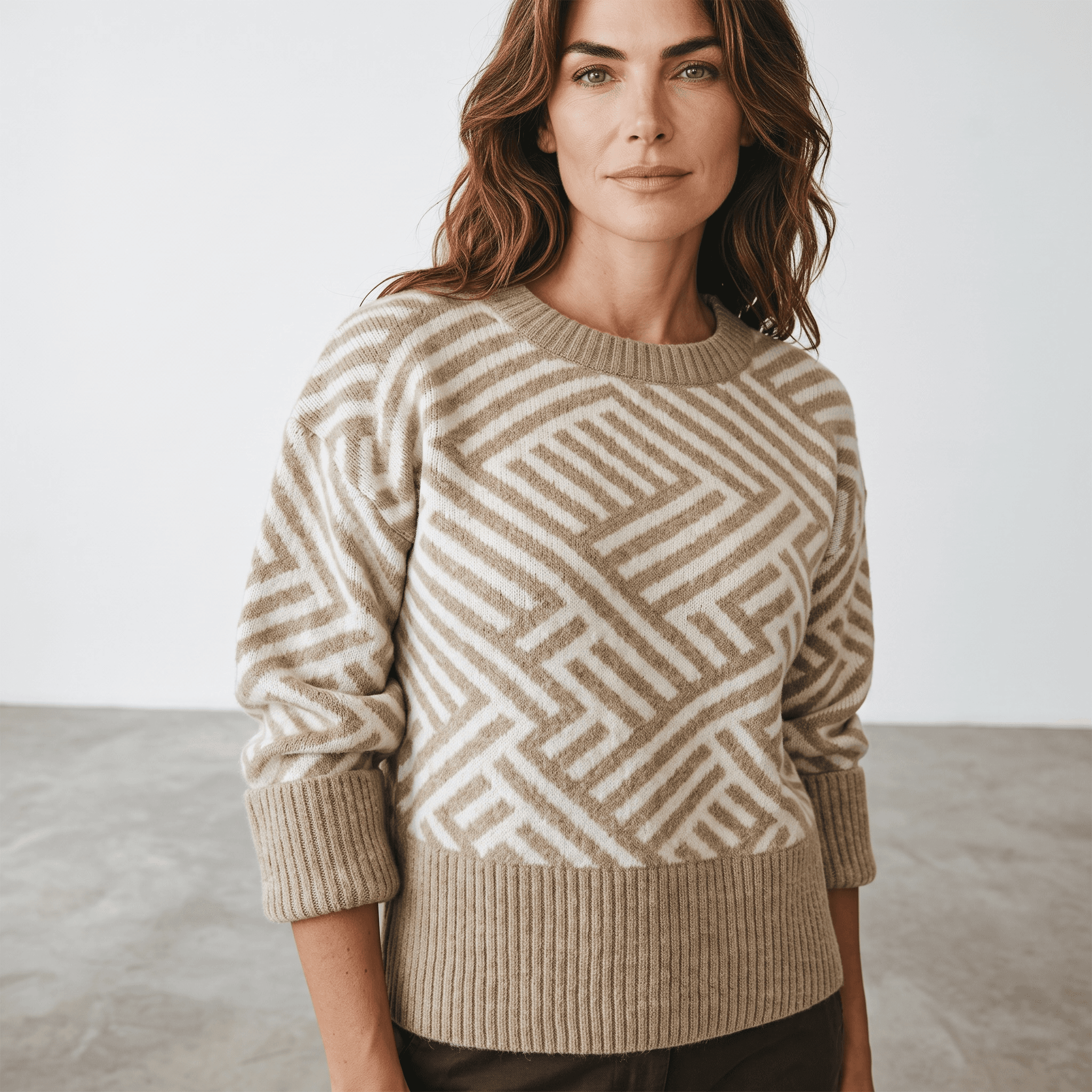 Chandail en tricot à motif géométrique et manches larges <strong><span style="color:#ad6a27;">BIENTÔT DISPONIBLE EN MAGASIN</span></strong>